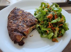 Una foto de Tortilla de papas y hongos Shiitake