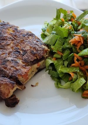 Una foto de Tortilla de papas y hongos Shiitake