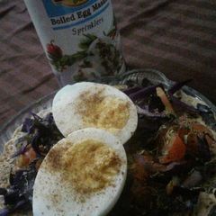 A picture of Masala papad with boiled egg.
