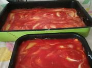 Una foto di mozzarella spinaci cannelloni