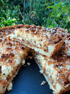 Una foto de Tarta de dulce de leche y coco