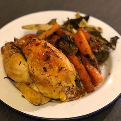 A picture of Roast poussin balsamic roast carrot and broccoli.