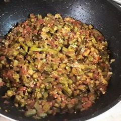 A picture of Bhuni Bhindi With Onion and Tomatoes.