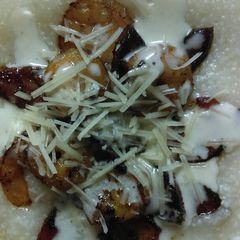 A picture of Shrimp, Sausage and Grits w/ Citrus Butter Sauce.