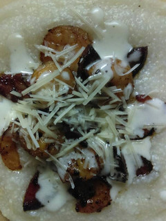 A picture of Shrimp, Sausage and Grits w/ Citrus Butter Sauce.