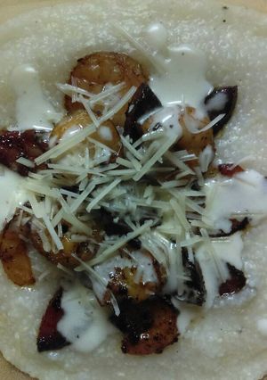 A picture of Shrimp, Sausage and Grits w/ Citrus Butter Sauce.