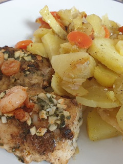 Una foto de Merluza con gambas y ajo