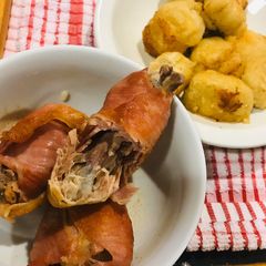 Dumplings and chicken repaid with bacon A picture of Dumplings and chicken repaid with bacon.