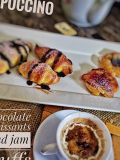 A picture of Chocolate croissants and jam puffs.