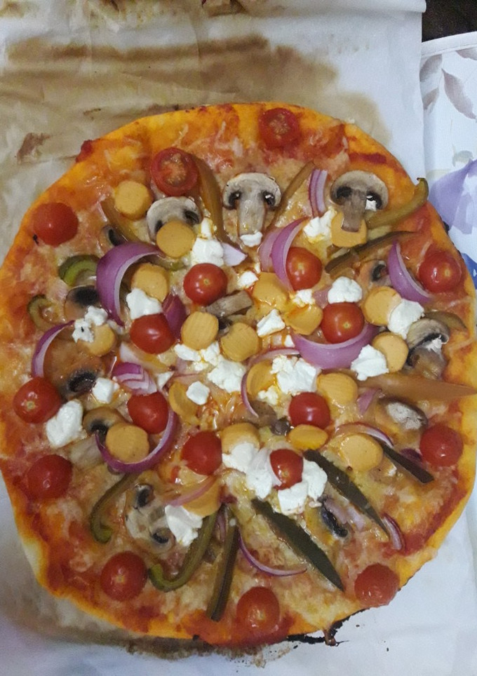 Una foto de Pizza vegetariana