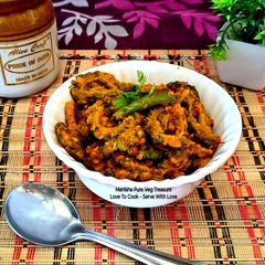 A picture of Kathiawadi-Style Crispy Bitter Gourd Curry (Karele ki Sabzi).