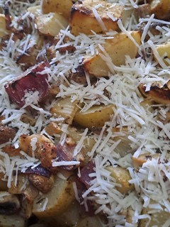 A picture of Over baked Chicken with Potatoes, Mushrooms and Onions.