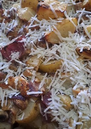 A picture of Over baked Chicken with Potatoes, Mushrooms and Onions.