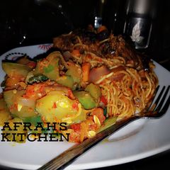 A picture of Spaghetti with cucumber sauce.