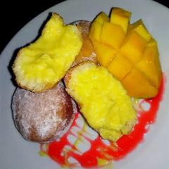 A picture of Donuts bun with mango curd filling.