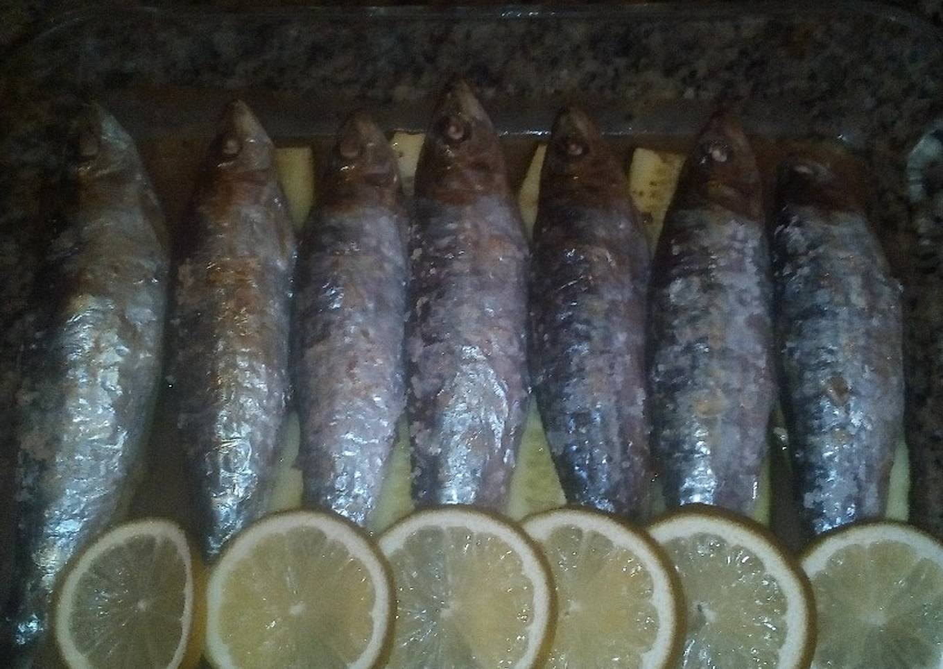 Sardinas al horno en cama de calabacín