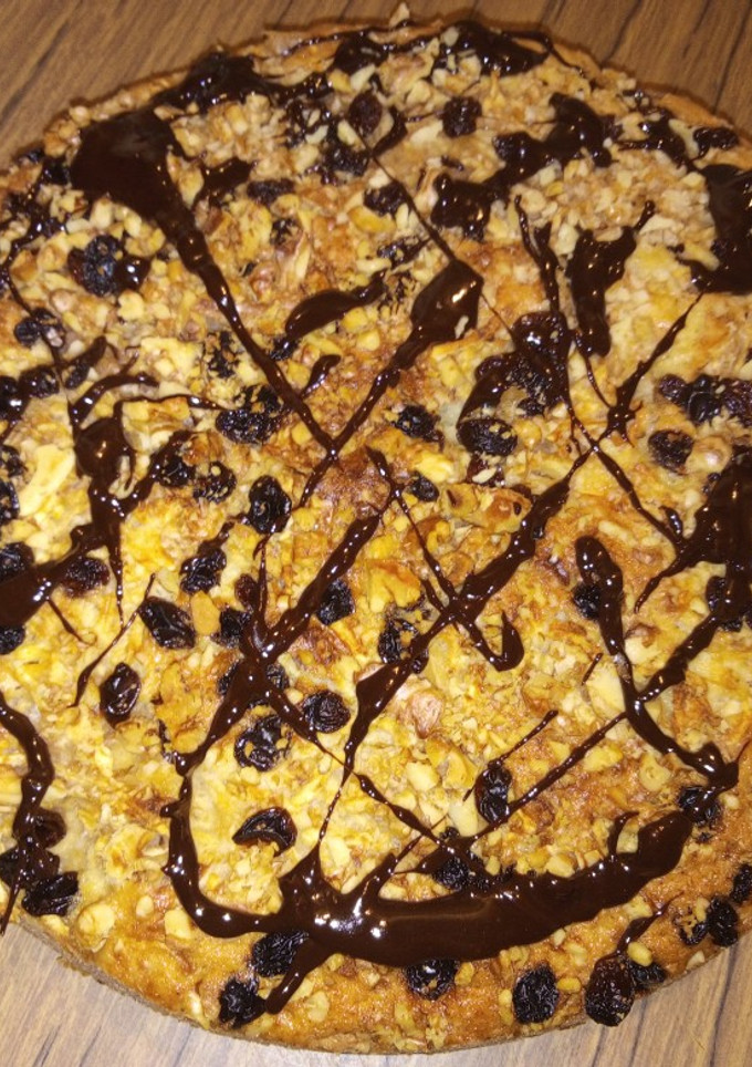 Una foto de Torta de manzana, nueces y pasas de uva