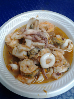A picture of Seafood soup with XO sauce.