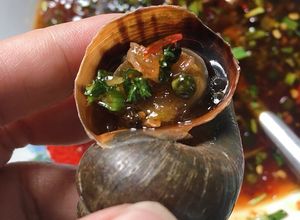 Hình của món Ốc bưu hấp nước mắm.