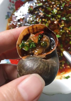 Hình của món Ốc bưu hấp nước mắm.