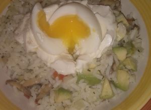 Una foto de Arroz gratinado con huevito pasado por agua🇦🇷😋