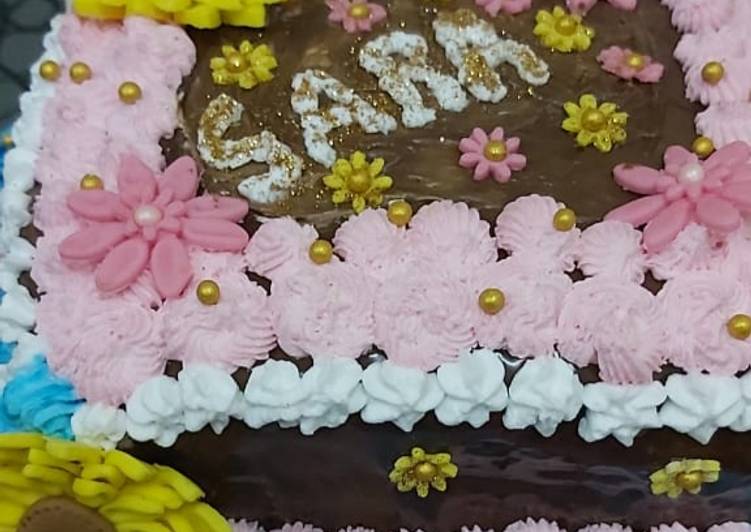 Cake with meringue buttercream frosting & Fondant flowers