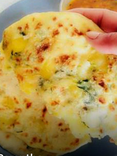 A picture of Aaloo Paratha(flavoured potato stuffed Indian flat bread).