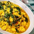 Arroz meloso con rodaja de pota y rúcula frita