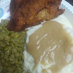 A picture of Fried Boneless Pork Chops and Gravy.