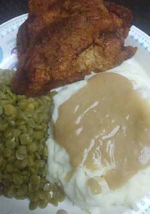 A picture of Fried Boneless Pork Chops and Gravy.