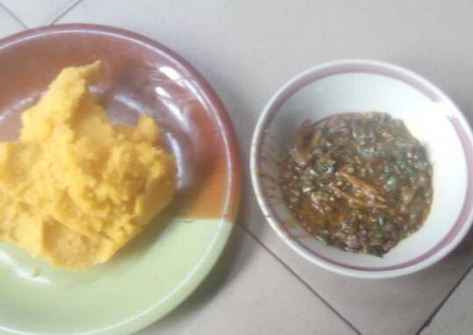 Okro soup with yellow garri