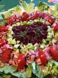Salade composée (chou rouge,scarole,tomate et concombre)