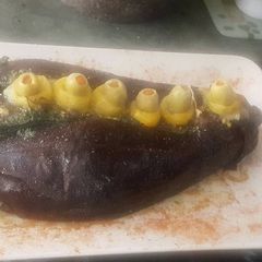 A picture of Stuffed eggplant.