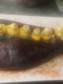 A picture of Stuffed eggplant.