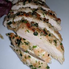A picture of Grilled Chicken Breast w/ Garlic & Parsley.