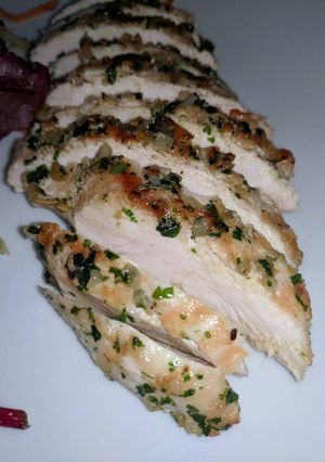 A picture of Grilled Chicken Breast w/ Garlic & Parsley.