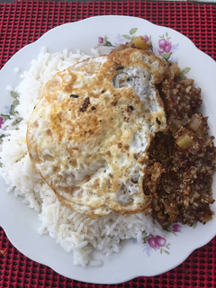 Una foto de Quinoa con chicha de jora