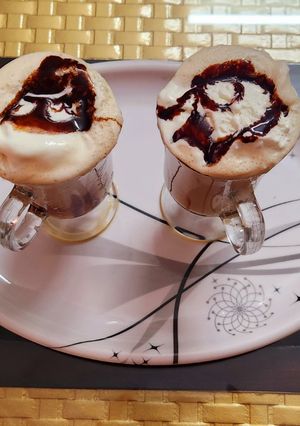 A picture of Coffee milkshake with ice cream.