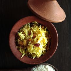 A picture of Basanti Pulao (Bengali Sweet Yellow Pulao).