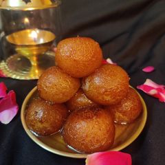 A picture of Bite size gulab jamun.