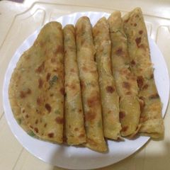 Chappati in butternut dhania carrot and egg mix A picture of Chappati in butternut dhania carrot and egg mix.