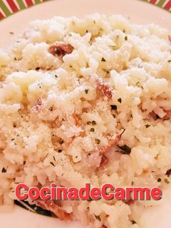 Una foto de Arroz o risotto con jamón