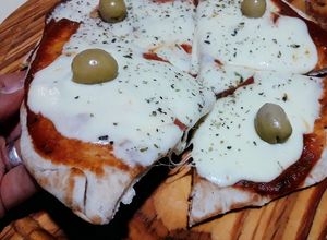 Una foto de Pizza en sartén Essen con harina Pureza