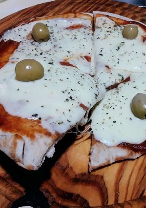 Una foto de Pizza en sartén Essen con harina Pureza