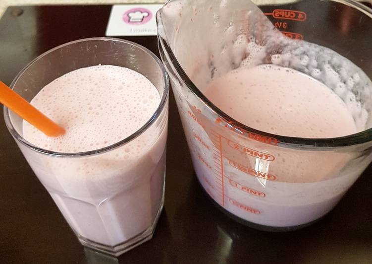 Steps to Make Ultimate Strawberry and cream milk shake