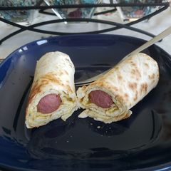 A picture of Hot dogs 🌭 with eggs 🥚.