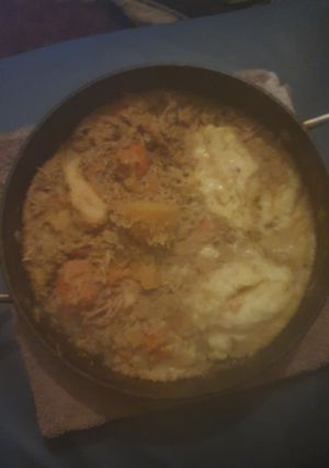 A picture of Chicken Stew sauce with Mash.