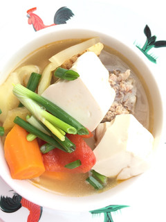 A picture of Salted Mustard Green And Tofu Pork Soup.