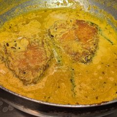 A picture of Bhetki Maacher sorshe jhal (Bhetki Fish cooked in mustard gravy).