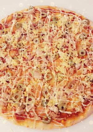 صورة لوصفة بيتزا بعجينة روعة 🍕🍕